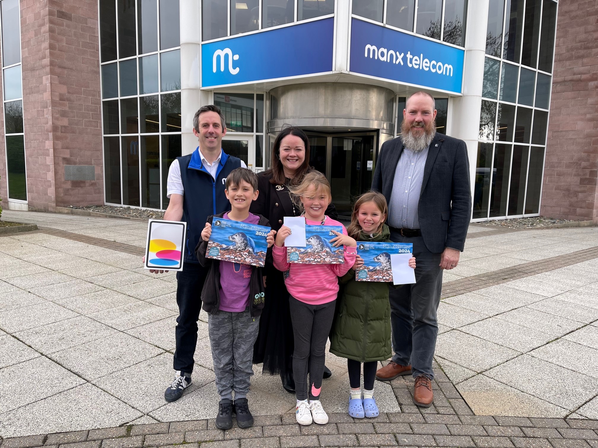 Left to right: Graham Makepeace-Warne (Manx Widlife Trust), Benjamin Danaher Pearce, Claire Milne (Love Tech), Sylvie Barron, Matthilda Martin and James Qualtrough (Manx Telecom)