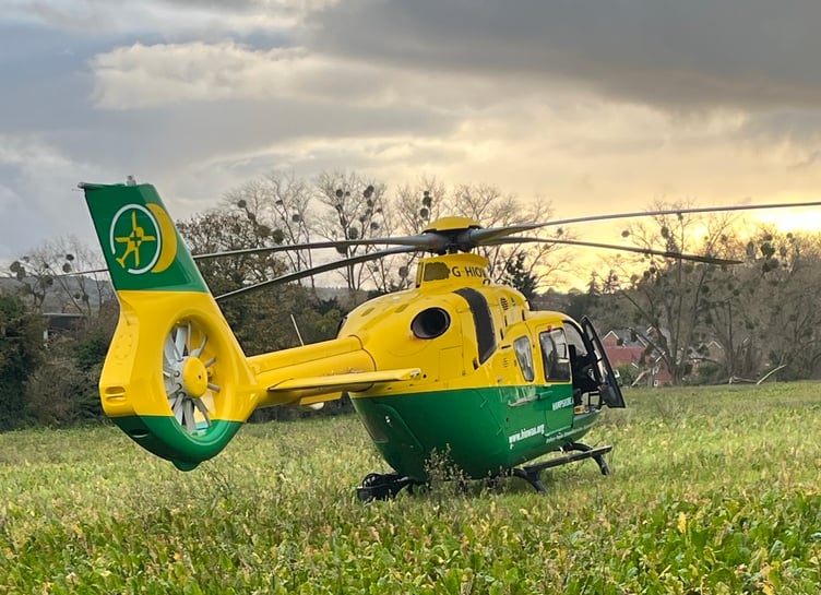 Dog walker Paul Grindley took this photo of the air ambulance after it landed on fields to the rear of the University for the Creative Arts in Farnham