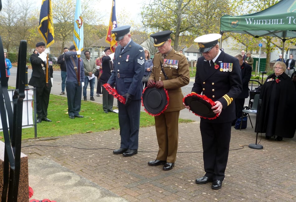 <p>Wreaths are laid at the war memorial at last year’s ceremony</p>
