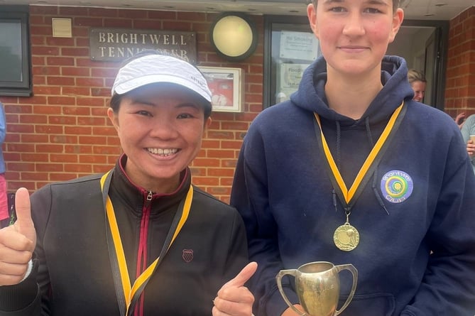 Ladies’ singles runner-up Wendy Poon (left) and 15-year-old champion Isabella Norman