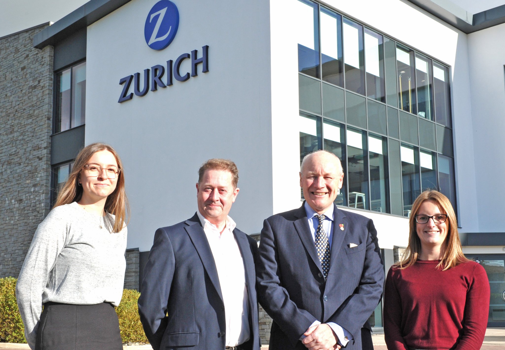 Sir John Lorimer is pictured (third from left) outside Zurich house with (left to right – all from Zurich) Dannielle Fox, Jason Buckley, and Katherine Blenkinsop