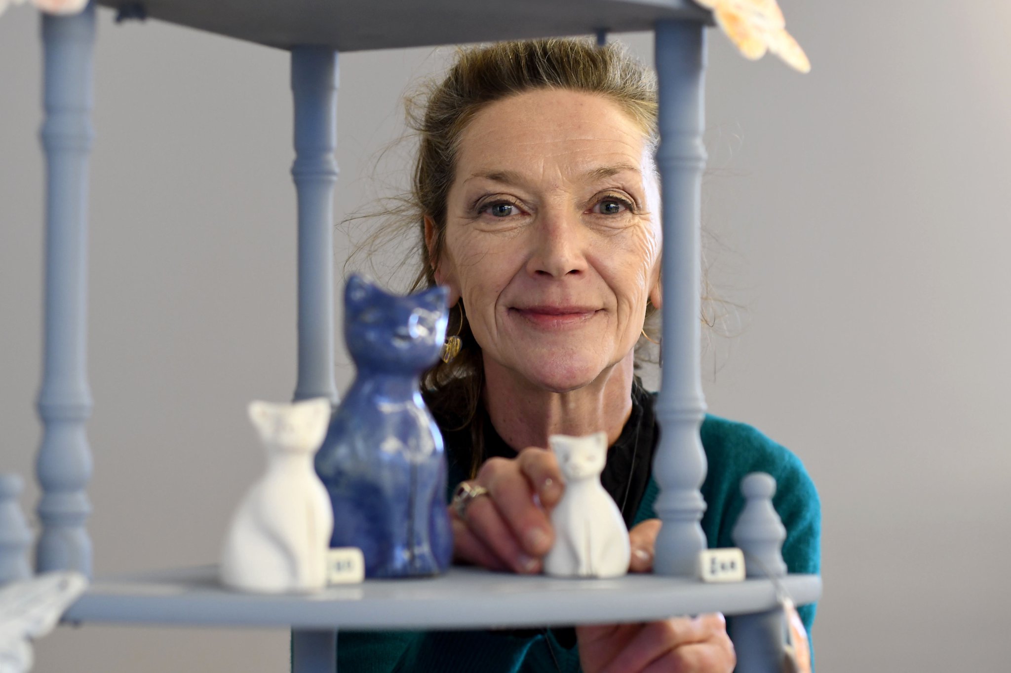 Manx Potters Fair at the Villa Marina Arcade - Celine Appleyard with her signature porcelain Manx cats