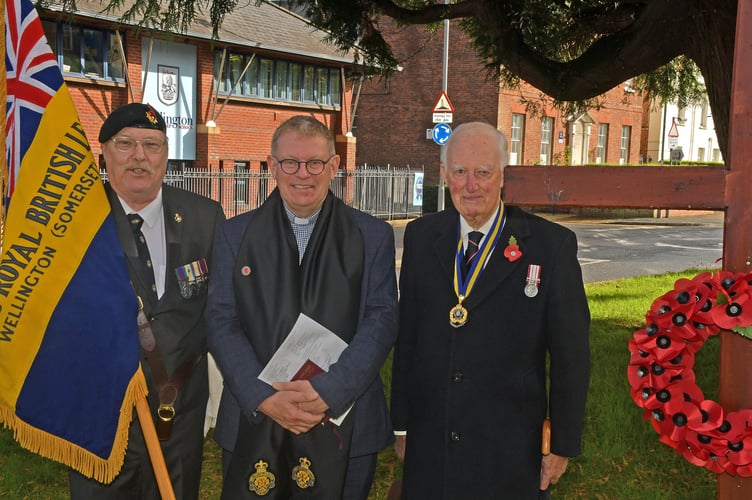 Wellington Royal British Legion branch officers (left to right) standard bearer Bob Trickey, chaplain the Rev Sam Griffith, and president Michael Rose at the Field of Remembrance service of dedication.