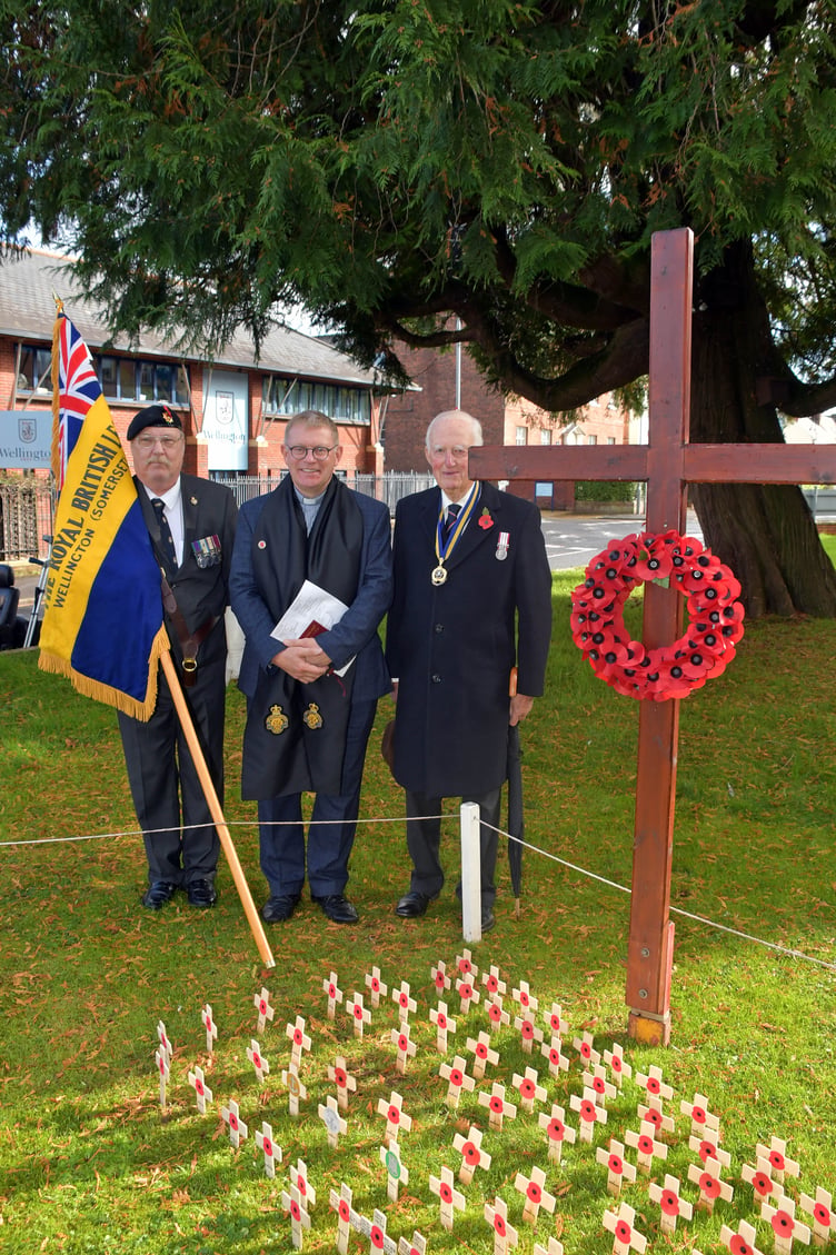 From the left, Wellington Royal British Legion standard bearer Bob Trickey, chaplain the Rev Sam Griffith, and president Michael Rose at the dedication of the Field of Remembrance.
