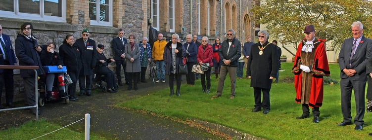 A large number of people turned out for the dedication of the Field of Remembrance outside Wellington Baptist Church on Sunday.