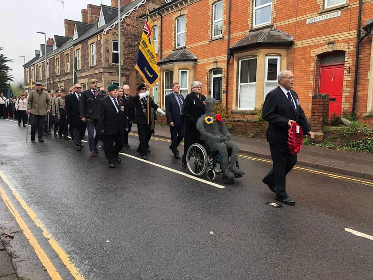 Sue and ‘Wivey Boy’ help to lead a Remembrance Sunday civic parade from The Square to St Andrew's Church, in Wiveliscombe.