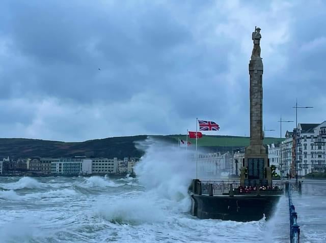 The railings behind Douglas war memorial will be replaced with a sea wall
