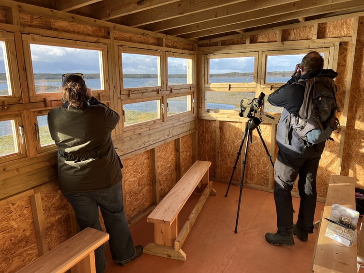 Manx Birdlife managing director Allison Leonard and site manager David Andrews in the hide at the new Point of Ayre national nature reserve