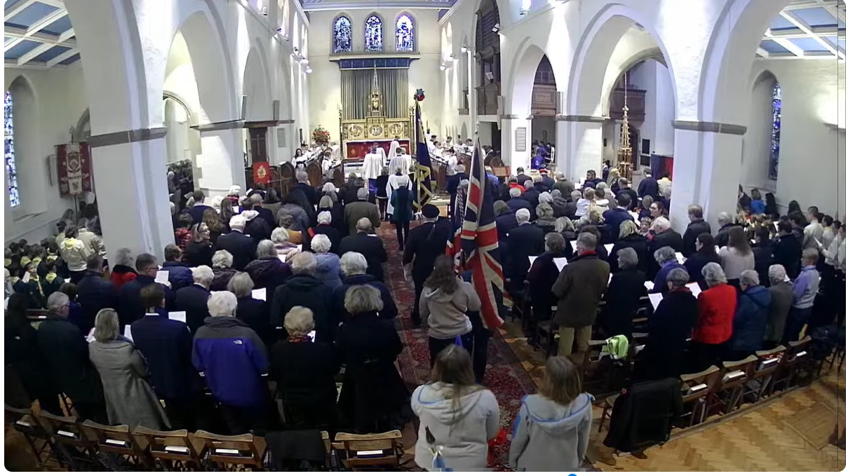 The Commemoration at St Thomas’s Church and War Memorial in the Bourne on Sunday. The British Legion, Scouts, Cubs, Beavers, Guides, Brownies and Rangers helped to fill the church to bursting point