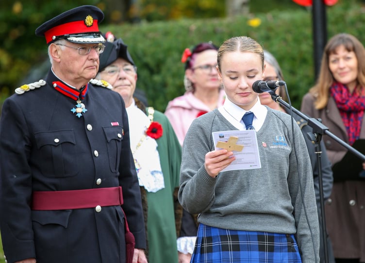 A Heath End pupil and the Deputy Lieutenant at Farnham’s schools Remembrance service