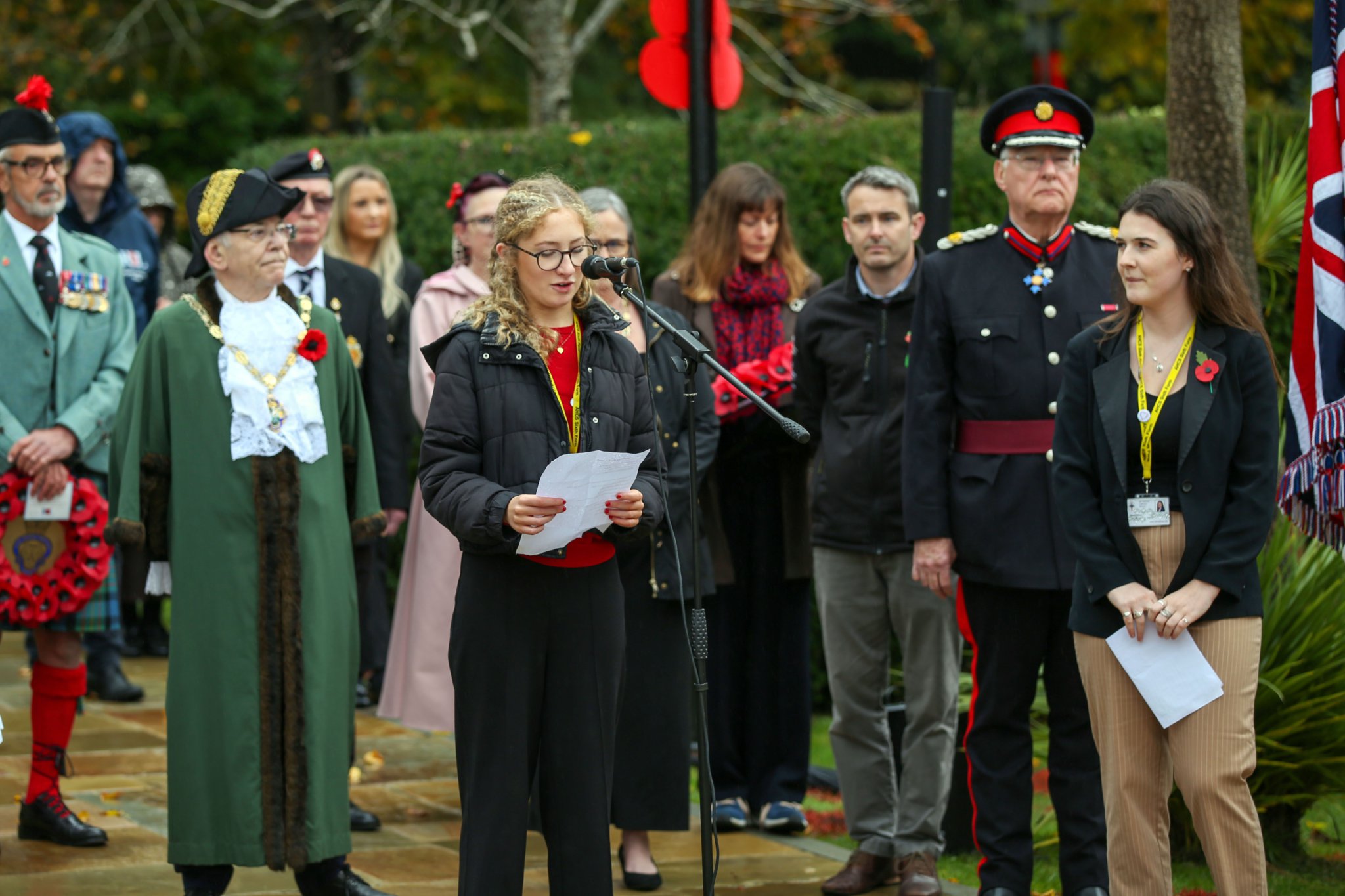 An All Hallows student addresses the crowd at the Farnham schools service