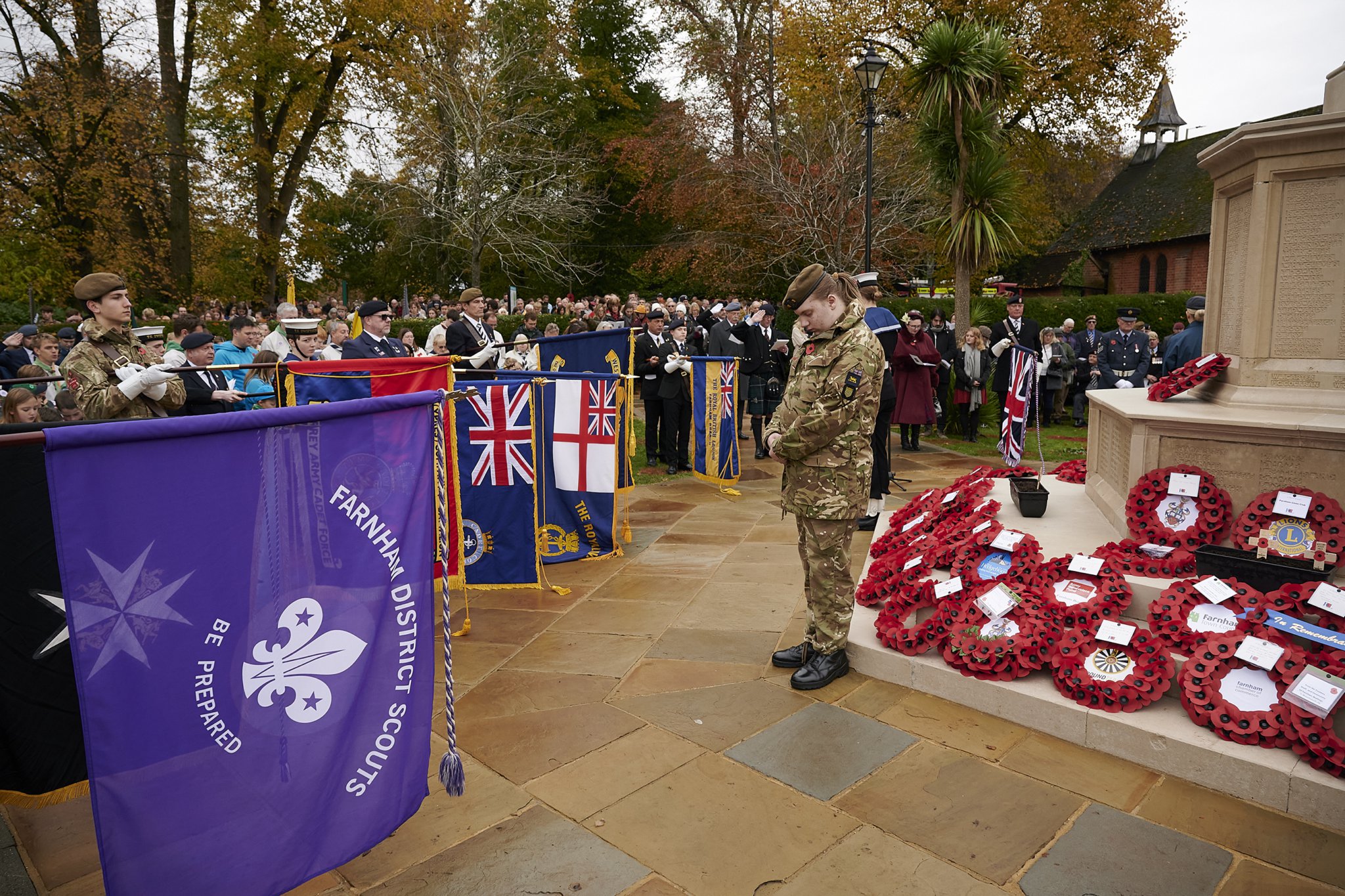 Cadets stand vigil at Farnham war memorial as the standards are lowered