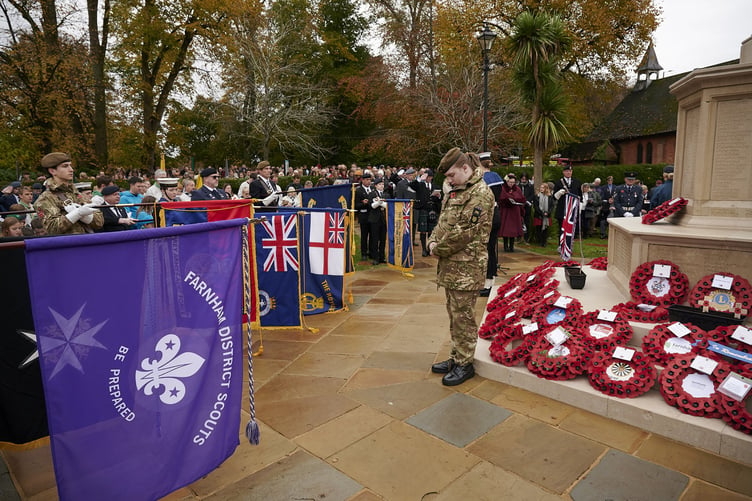 Cadets stand vigil at Farnham war memorial as the standards are lowered