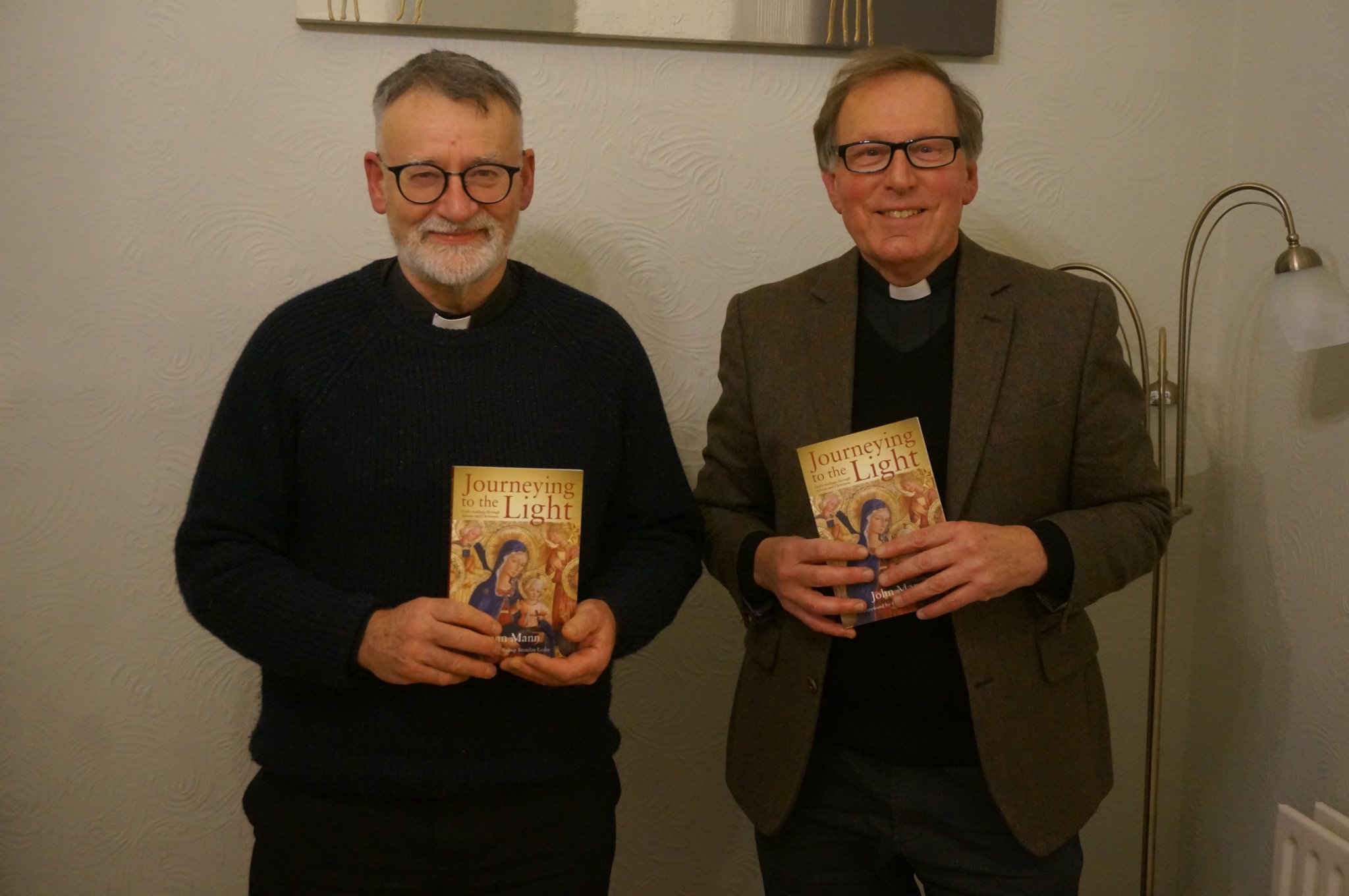 The island launch of Journeying to the Light. Pictured from left are Nigel Godfrey, Dean of St German’s Cathedral, and author John Mann