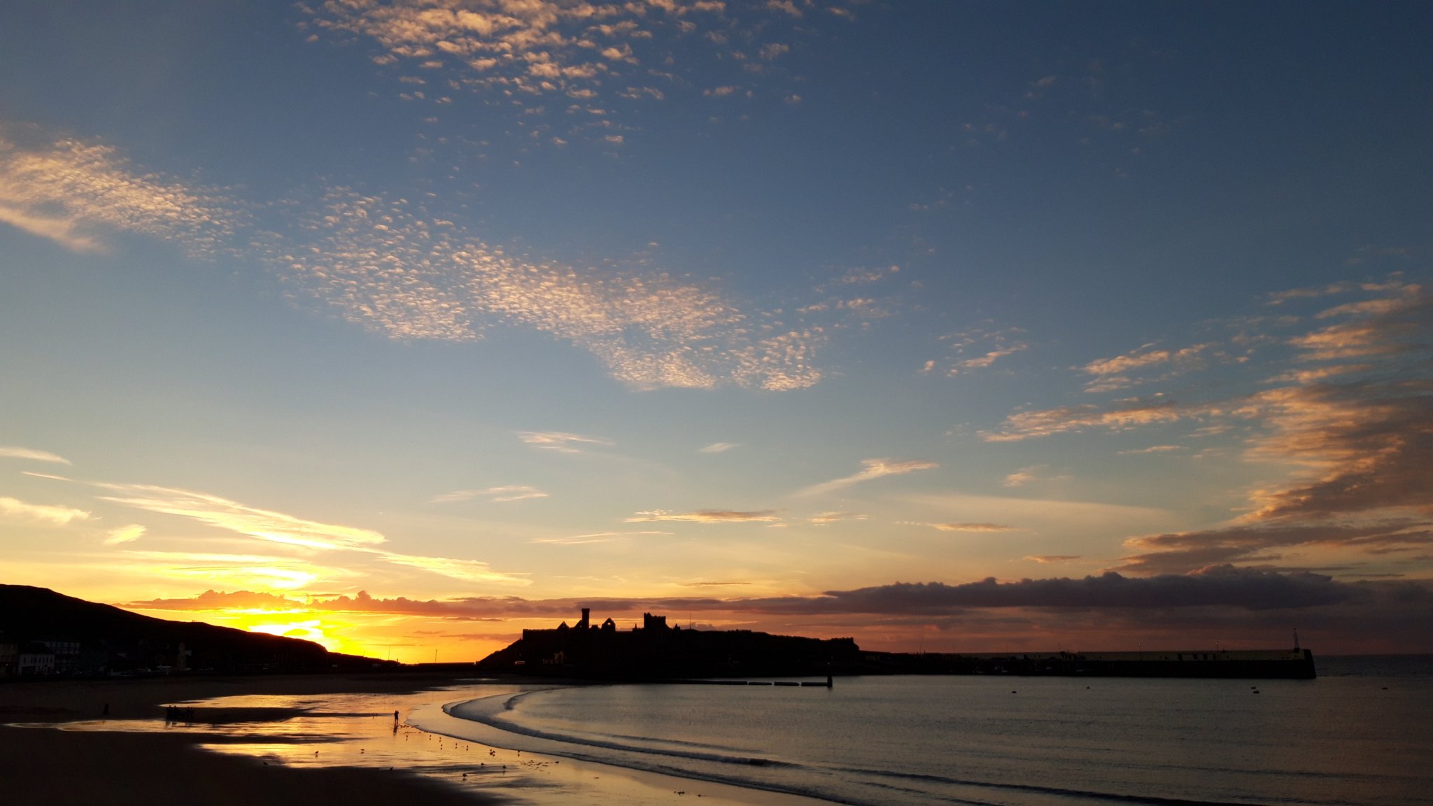 James Franklin’s photo of Peel sunset is used as the image for the production of The Manxman; Left, Hall Caine