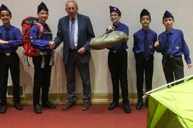Members of 2nd Alton Boys' Brigade and Cllr Graham Hill with new camping gear.