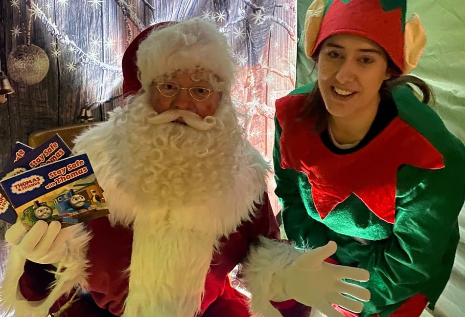 <p>Father Christmas and his elf are ready to meet the children of Alton </p>