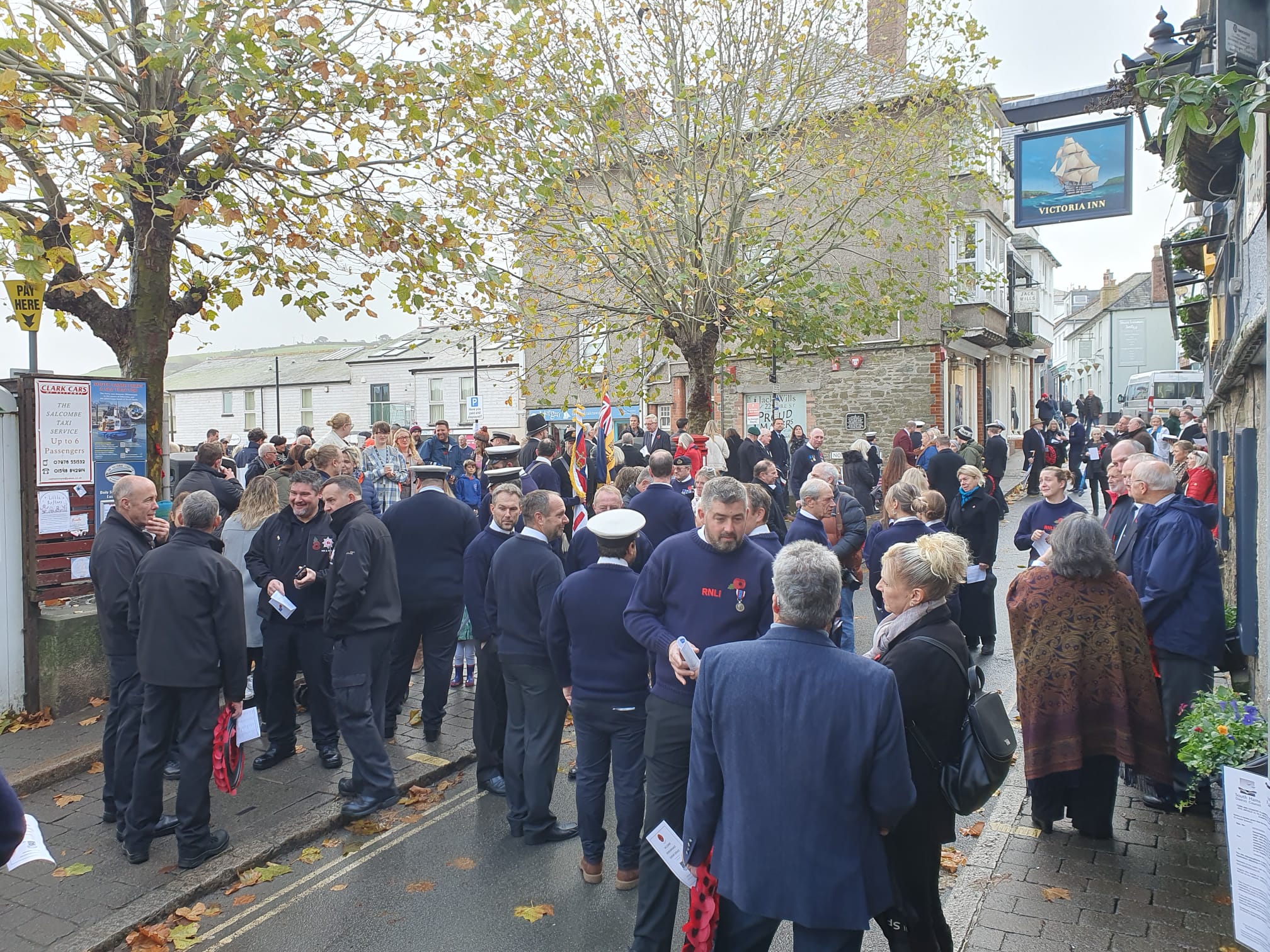 The public gather to pay their respects in Salcombe