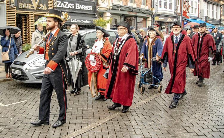 Members of Abergavenny Town Council marched towards the war memorial