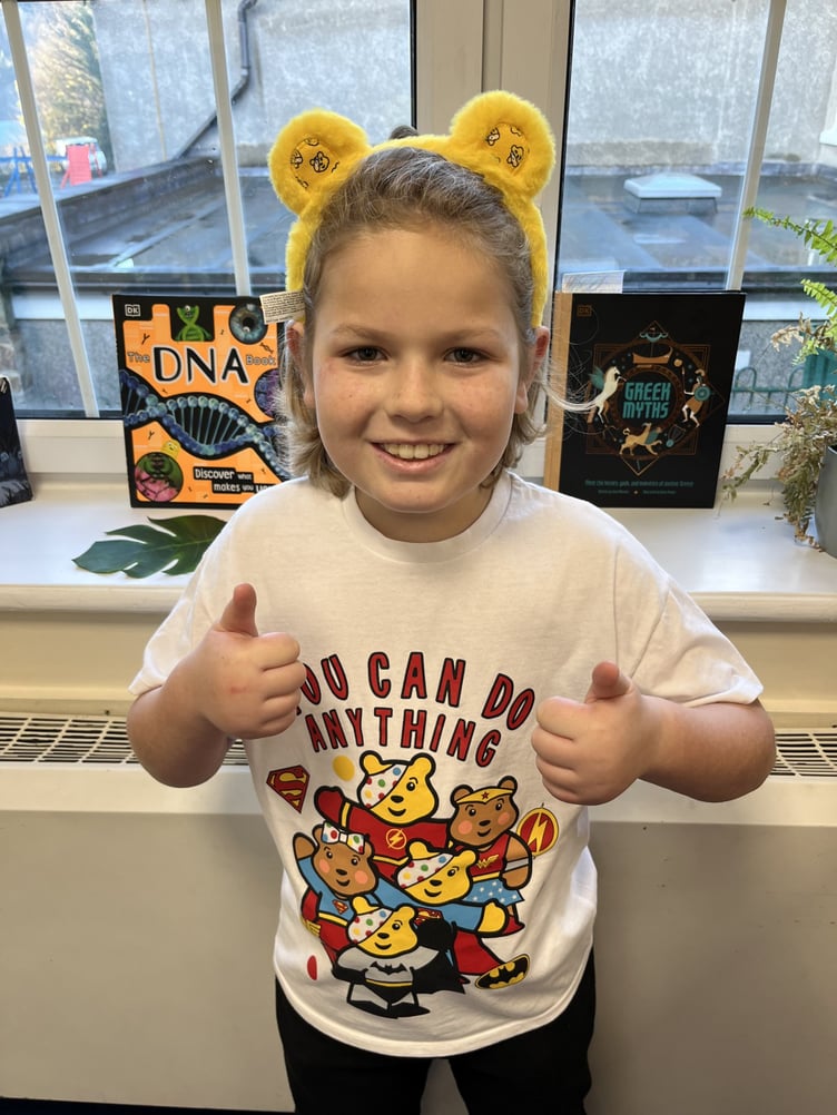 Cameron Mackie, a year five pupil at Laxey Primary School, wearing Pudsey ears and a Children in Need t-shirt