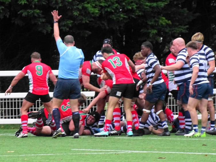 Harley Orr drives Nic Wilde to score
