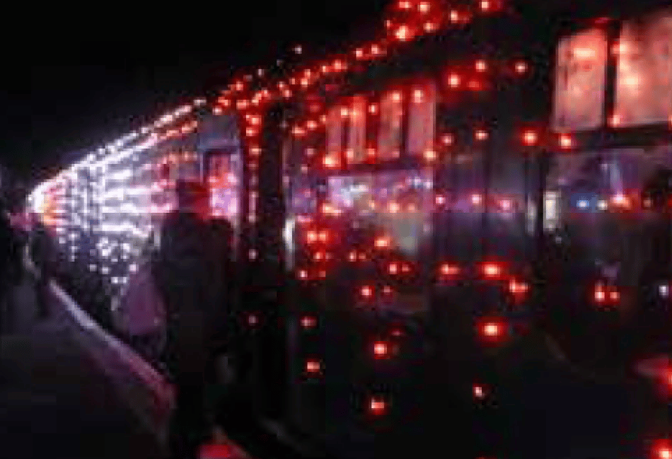 <p>Passengers board the Steam Illuminations train at Alresford station</p>