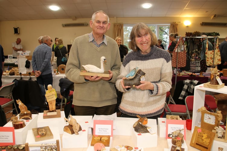 Colin Burlton collects wood from hedgerows and woods once it is felled and makes many items to sell. He is pictured with his wife Maureen. AQ 2786