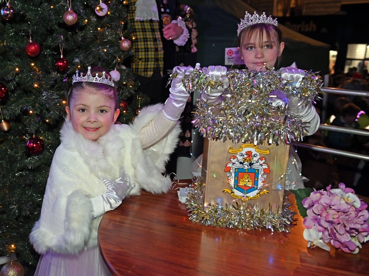 Given the honour of turning on the Christmas Lights are the Launceston Carnival Royalty Rafaela Holden (Attendant) and Jessica Heywood (Carnival Queen)
