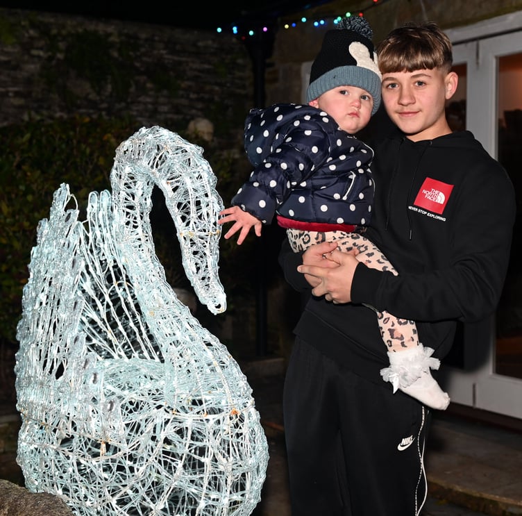 Taking a look at the festive lights are Alfie and Tyga