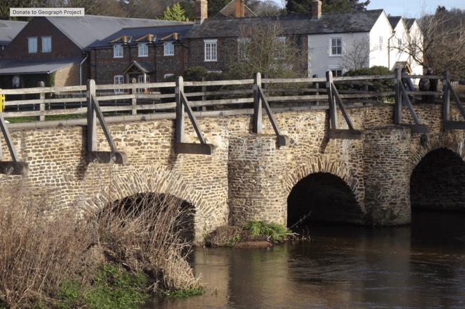 Celebrated medieval stone bridge spanning the River Wey at Tilford.