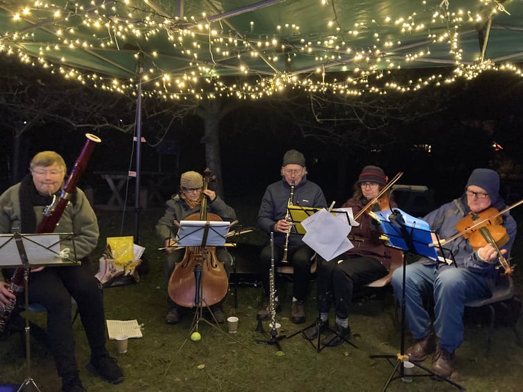 Carhampton village band which forms each year for the Christmas lights switch-on in the orchard.