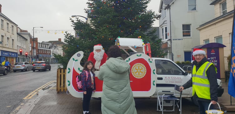 Santa visited Wellington town centre on Saturday to the delight of local families.