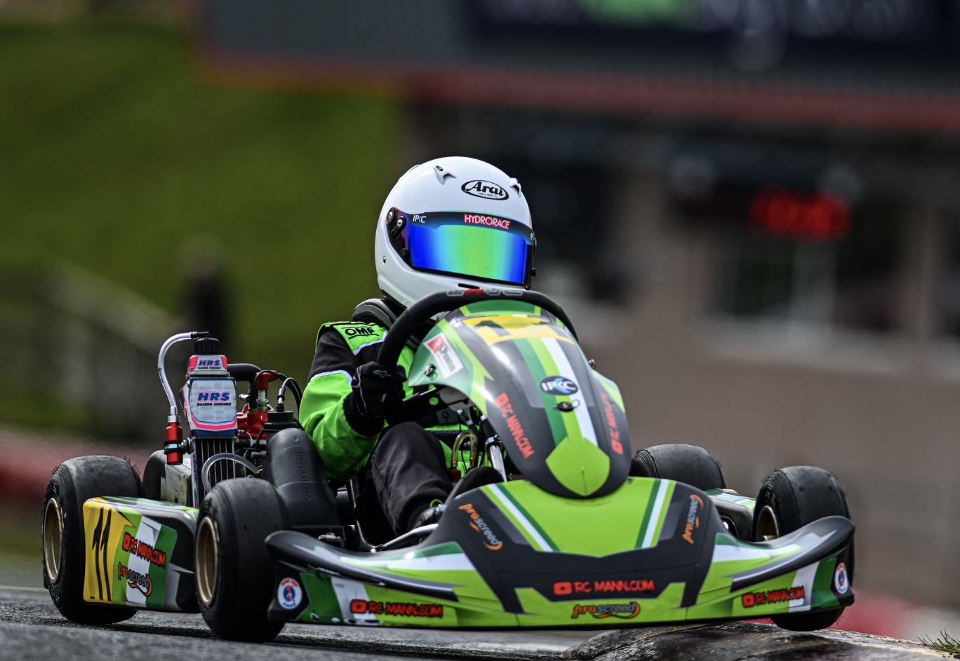 Jayjay Plowman in action in his RC Mann.com Rotax Inter and (inset) with his trophy at Rowrah recently