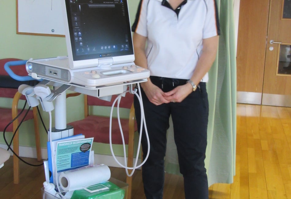 <p>Jo Hounsome with the new diagnostic ultrasound</p>