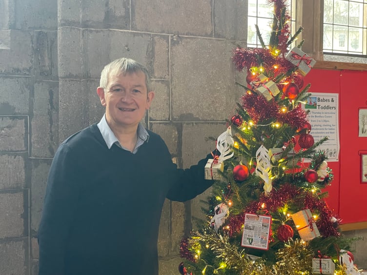 The Crediton Courier tree with the Courier Editorial Manager Alan Quick. AQ 1447