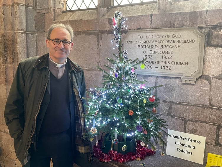 Rev Preb Matthew Tregenza beside the Boniface Centre Babies and Toddlers tree. AQ 1650