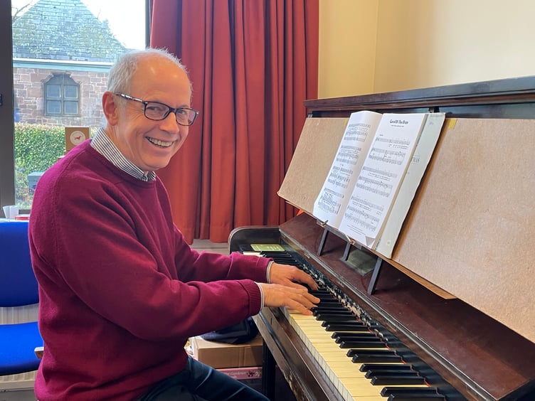 Rev Nigel Guthrie played the piano at the Boniface Centre for those visiting the Cafe. AQ 1652