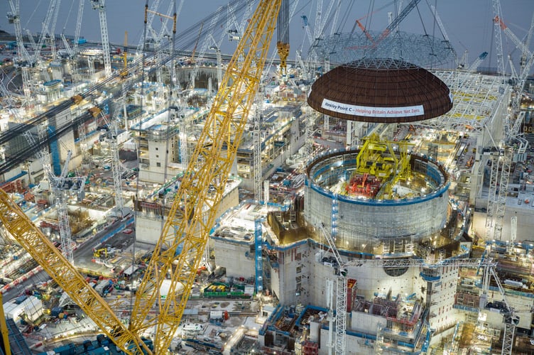A spectacular drone's eye view of the lift of Hinkley Point C's first reactor building dome.
