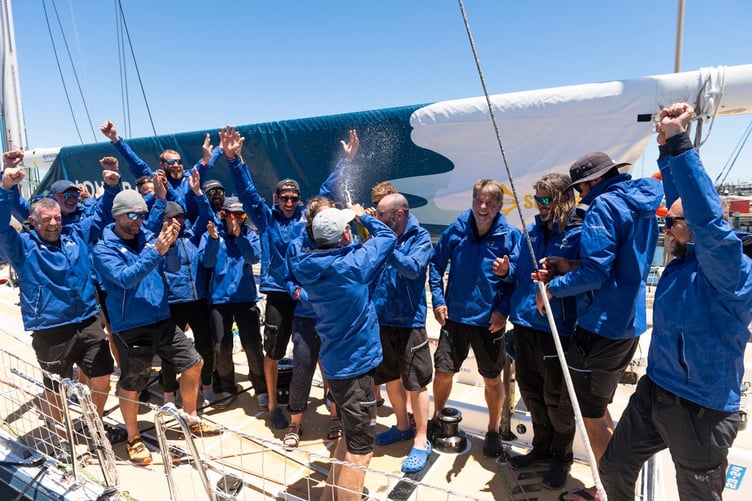 Eric Froggatt, far left, celebrates with crew