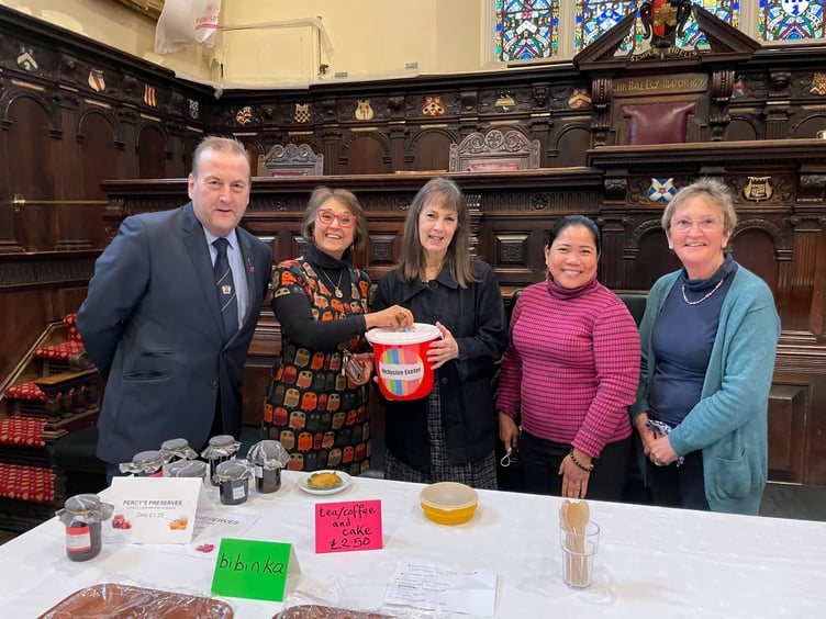 Inclusive Exeter volunteers and two Exeter City Councillors at a coffee morning held at Exeter Guildhall.