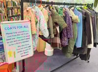 <p>Farnham Library's Coats for All rail</p>