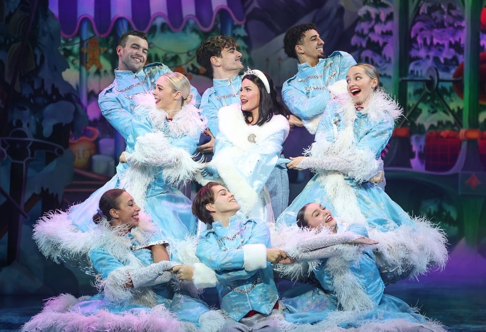 <p>Kirsty Ingram, as Snow White, and ensemble</p>