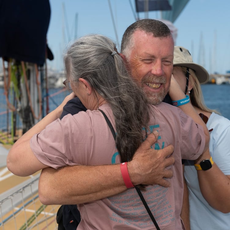 Eric Froggatt says goodbye to wife Lisa ahead of the 2,500-mile over Christmas leg around Australia