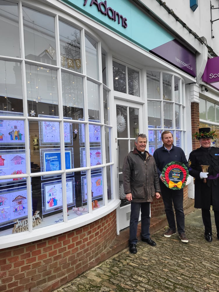 Henry Adams won first prize for most complementary window to the business
and was dressed by Camelsdale School