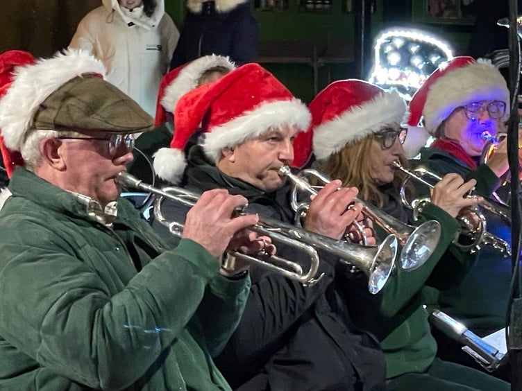 Some of the band members during Carols in the Square. AQ 2507