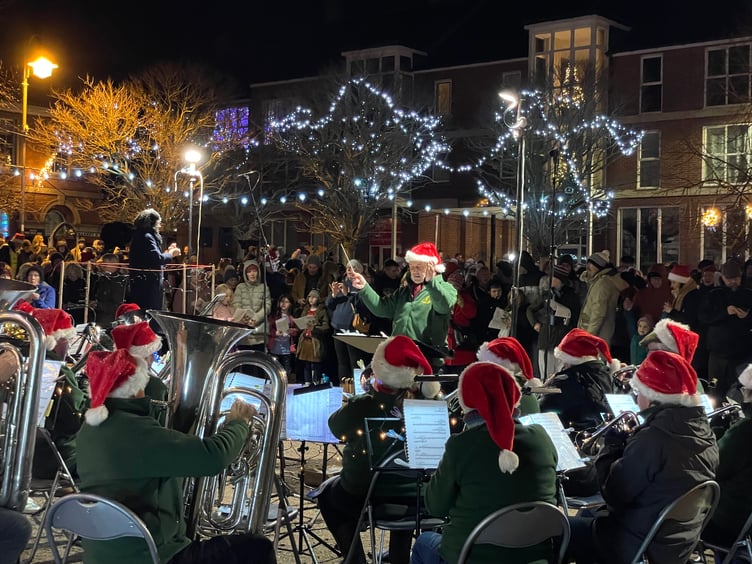 Crediton Town Band performing for Carols in the Square. AQ 2503