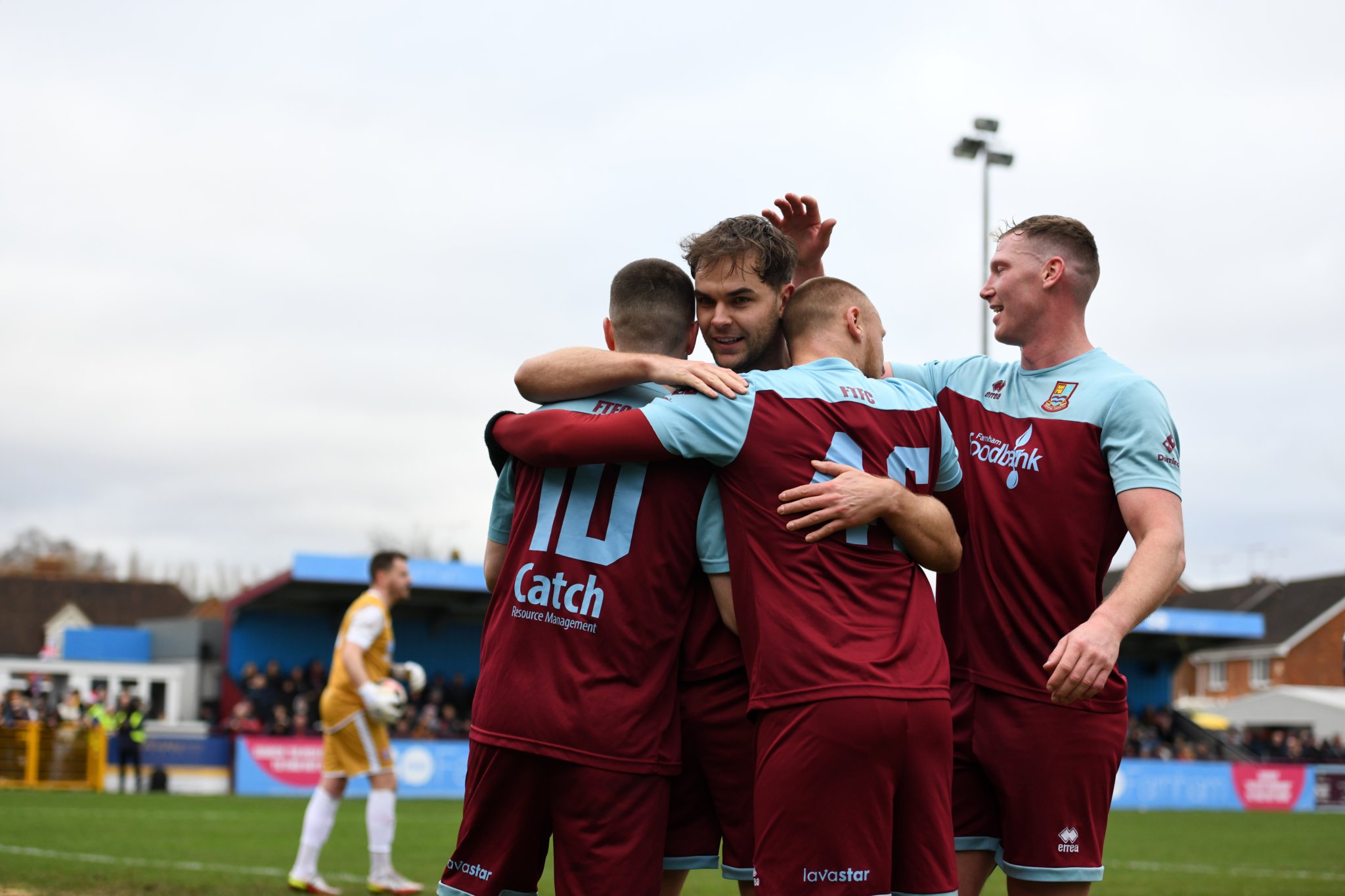 Harry Cooksley is congratulated after giving Farnham the lead