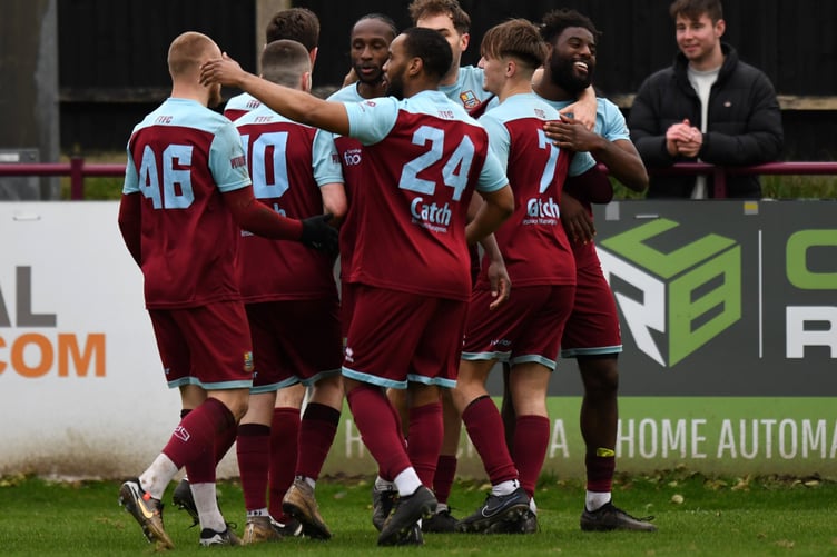 Farnham Town celebrate Lamar Koroma's goal against Camberley Town