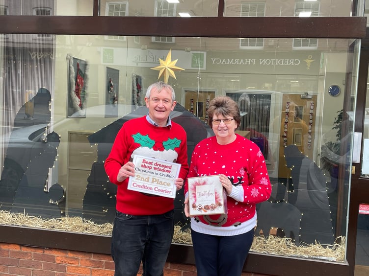 Alan Quick, Editor of the Crediton Courier, presented Clair Mann of Bedford and Co, with the second prize and certificate. AQ 2453