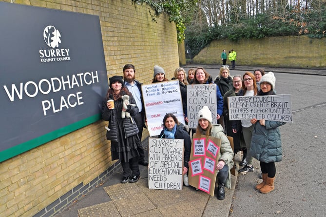 Parents protesting outside Surrey County Council, Woodhatch Place, Cockshot Hill, Reigate. Complaining about the lack of resources for parents of children with special educational needs.  GL
